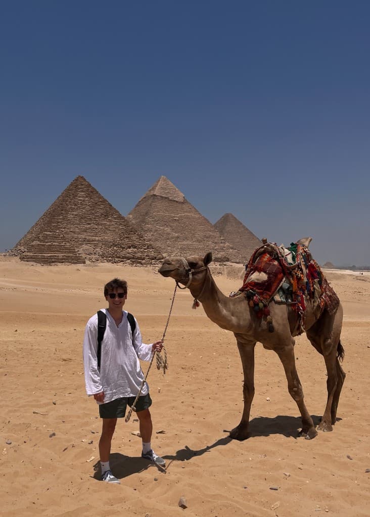 At the Pyramids of Giza with a camel